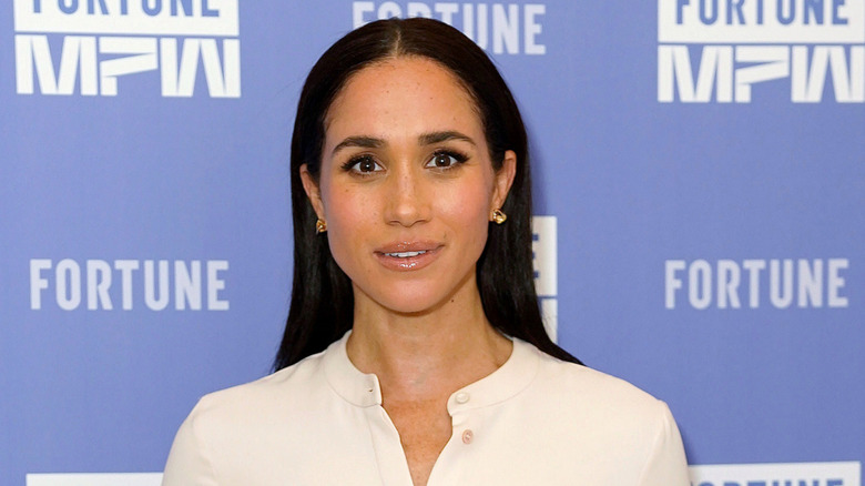 Meghan Markle smiling slightly