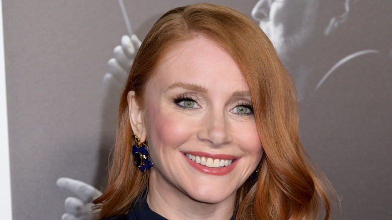 Bryce Dallas Howard smiling at a red carpet event