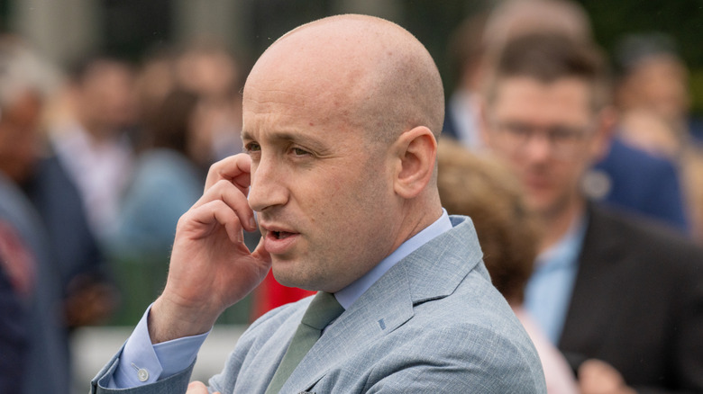 Stephen Miller talking on the phone at the White House Easter egg roll