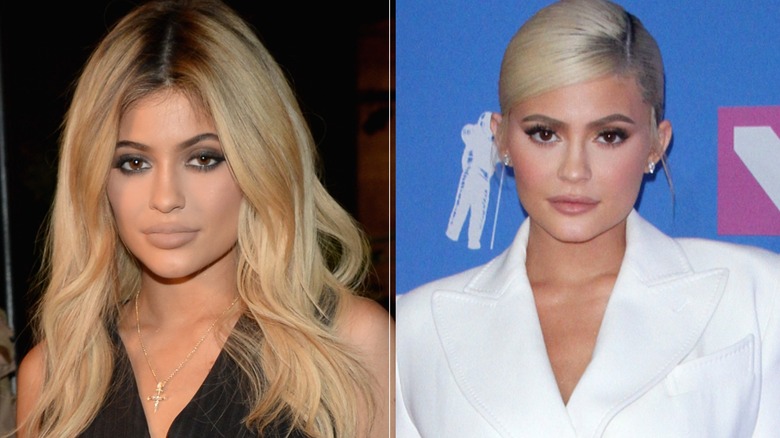 Kylie Jenner with long blonde hair and black top and with hair pulled back and white blazer