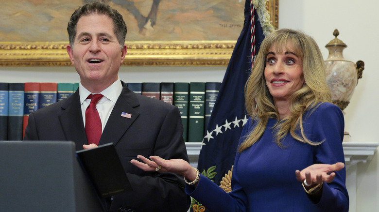 Michael and Susan Dell speaking at an event at the White House