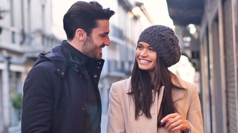 woman and man looking at each other