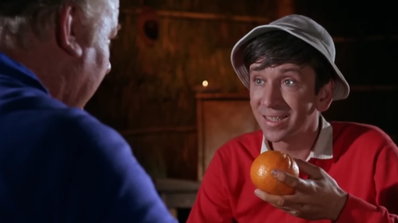 Alan Hale Jr. as The Skipper and Bob Denver as Gilligan, holding an orange, on Gilligan's Island