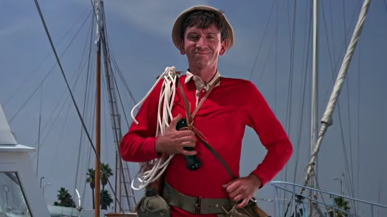Bob Denver as Gilligan, rope coiled around his arm, in the opening credits of Gilligan's Island