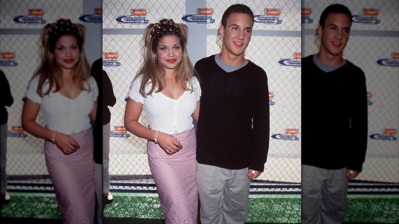 Danielle Fishel and Ben Savage with their arms around each other at the 1999 Kids' Choice Awards.