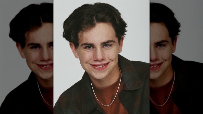 Rider Strong smiling in a 1995 promo picture.