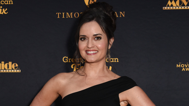 Danica McKellar smiling at an event in 2024