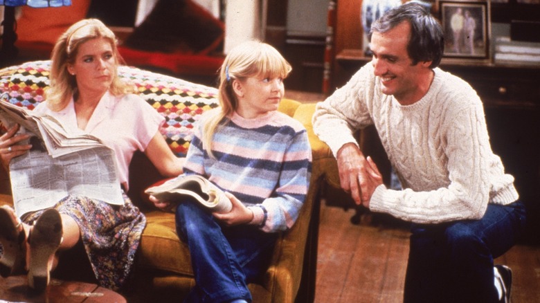 Michael Gross, Meredith Baxter, and Tina Yothers in a scene from "Family Ties"