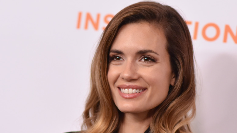 Torrey DeVitto smiling 