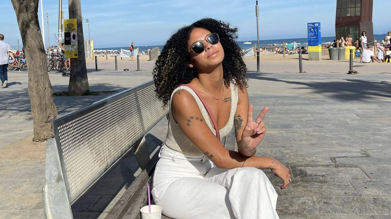 Gabriela poses on bench