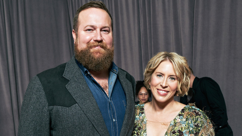 Ben and Erin Napier smiling while posing for photos together