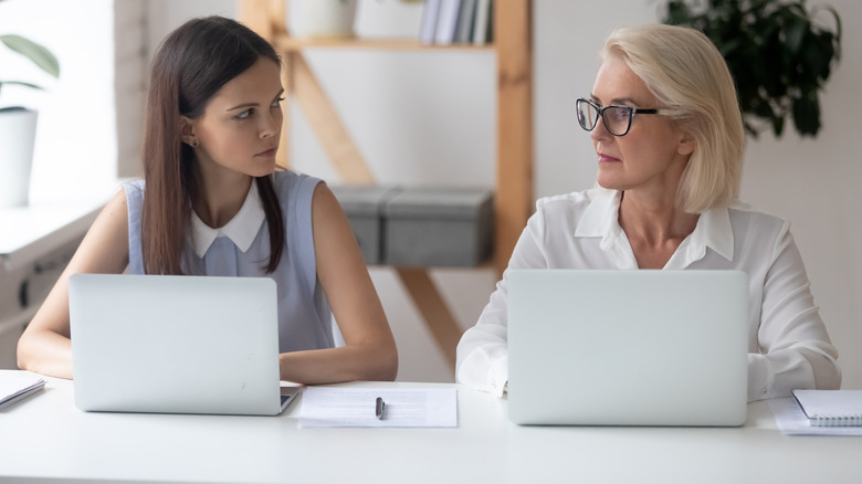 Women sitting at a desk 