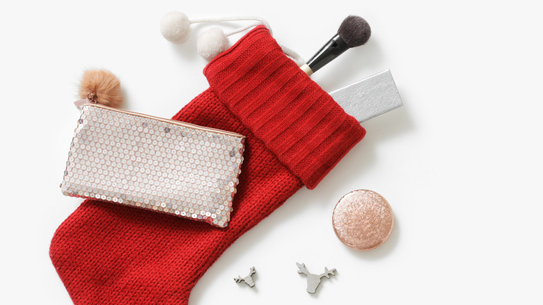 Christmas stocking with assorted makeup products