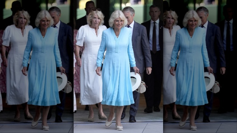 Queen Camilla wearing a turquoise dress at Wimbledon 2026