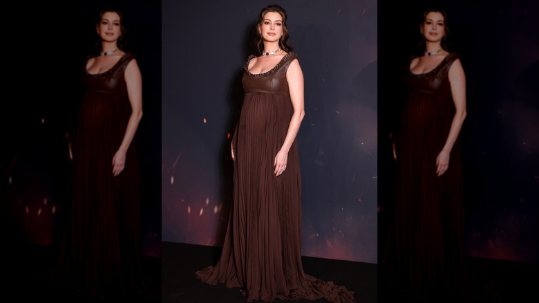 Anne Hathaway slightly lifting her chin