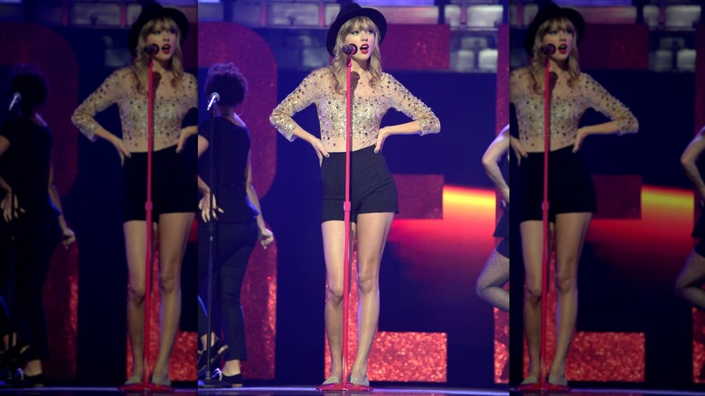 Taylor Swift performing on stage at the 2012 iHeartRadio Musical Festival