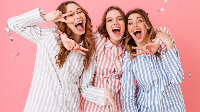 Happy women in striped pajamas