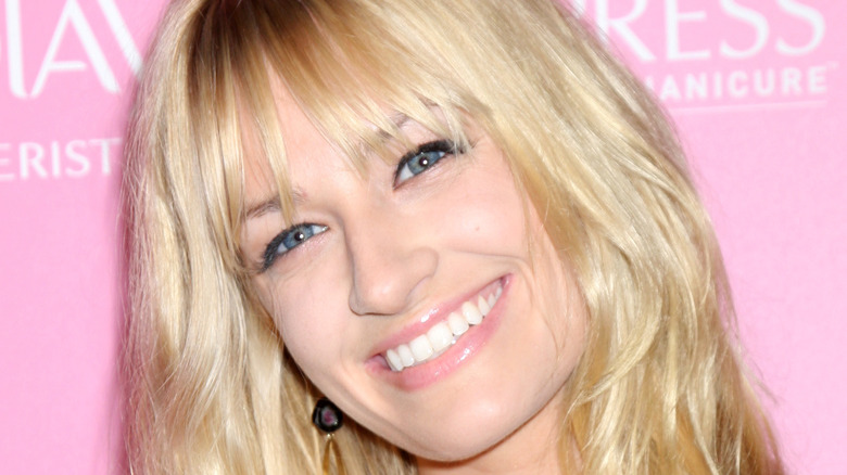 beth behrs smiles