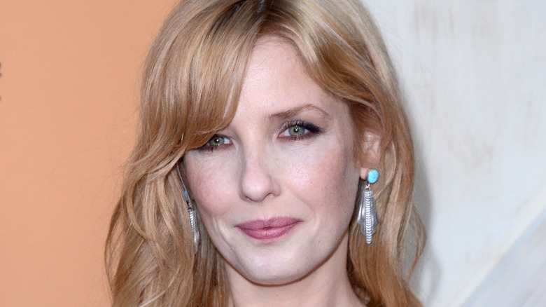 Kelly Reilly smirking