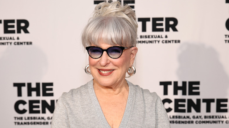 Bette Midler smiling with sunglasses
