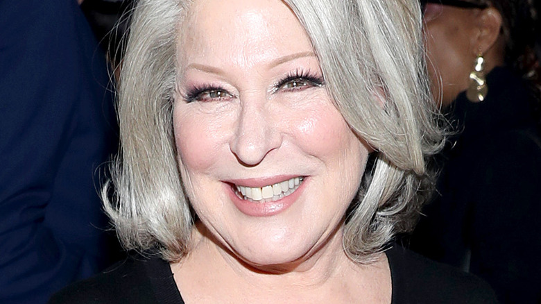 Bette Midler smiling with platinum hair