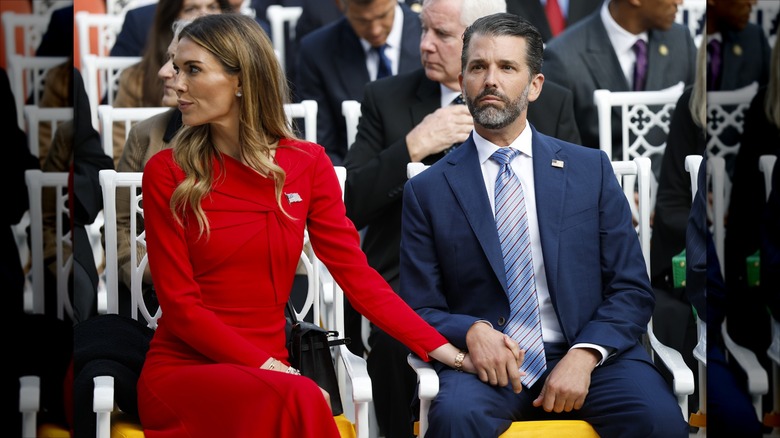 Bettina Anderson holding Donald Trump Jr.'s hand
