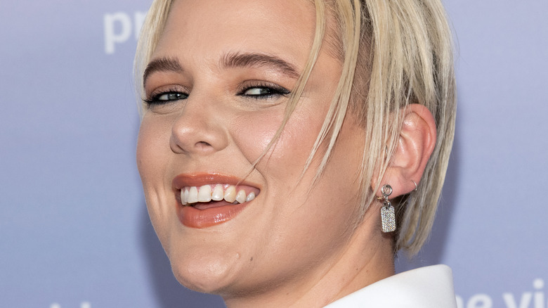 Betty Who smiling on the red carpet