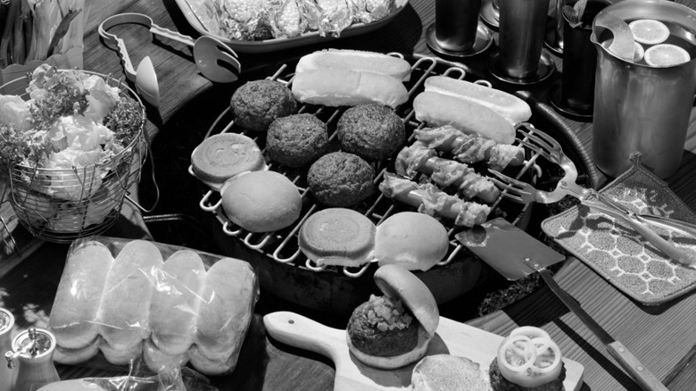 A black-and-white photograph of barbecue food