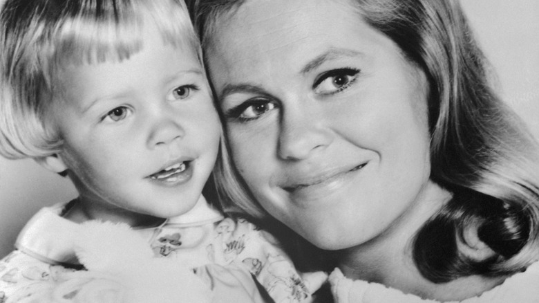 A young Erin Murphy photographed with a smiling Elizabeth Montgomery