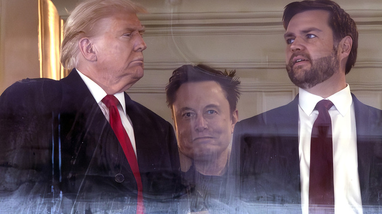 Donald Trump and JD Vance pictures with Elon Musk between them