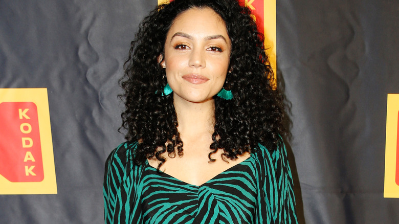 Bianca A. Santos smiling on a red carpet