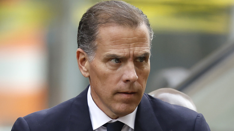 Hunter Biden looking stern while wearing a suit