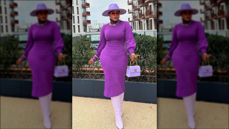 woman wearing purple fedora hat