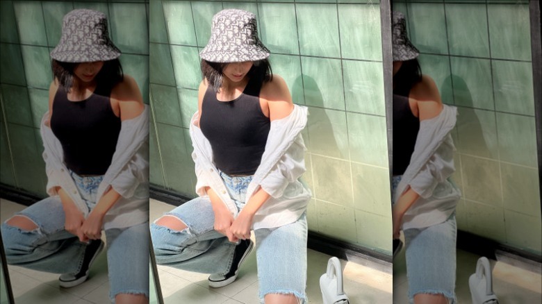 woman wearing print bucket hat