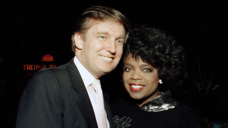 Oprah Winfrey and Donald Trump smiling together