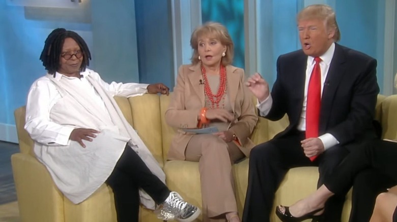 Donald Trump appearing on The View alongside Barbara Walters and Whoopi Goldberg in 2011.