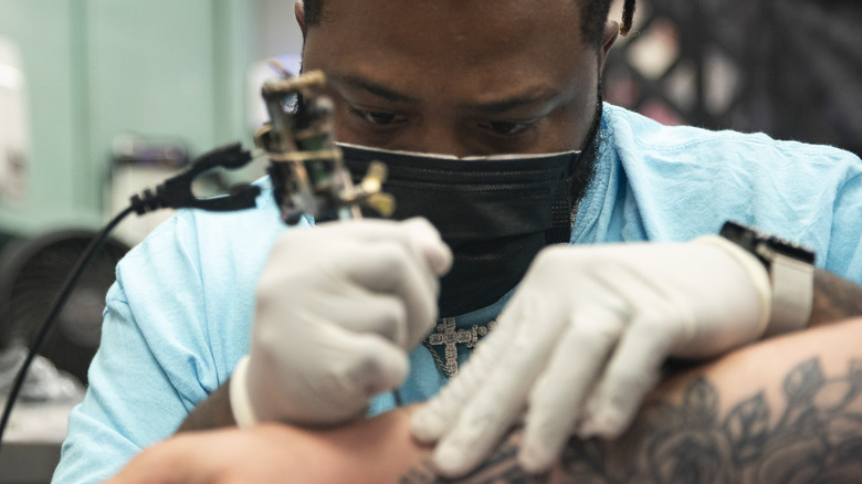 Inking a tattoo
