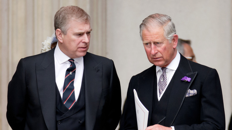 Prince Andrew and King Charles III talking