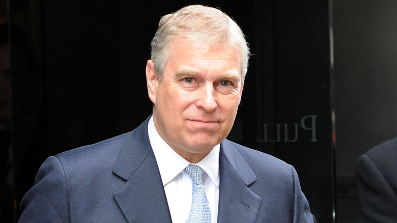 Prince Andrew smiling for camera