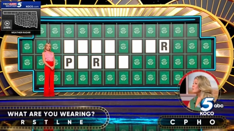 A "Wheel of Fortune" contestant tries to solve a puzzle