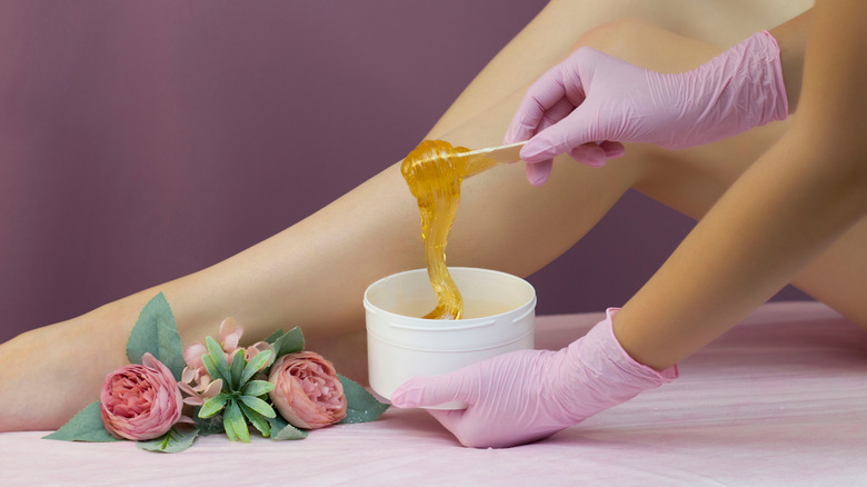 Person waxing their legs