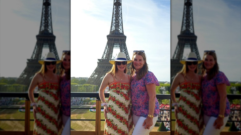 Jenn and Melinda Gates posing in front of the Eiffel Tower in Paris for the 2024 Olympics