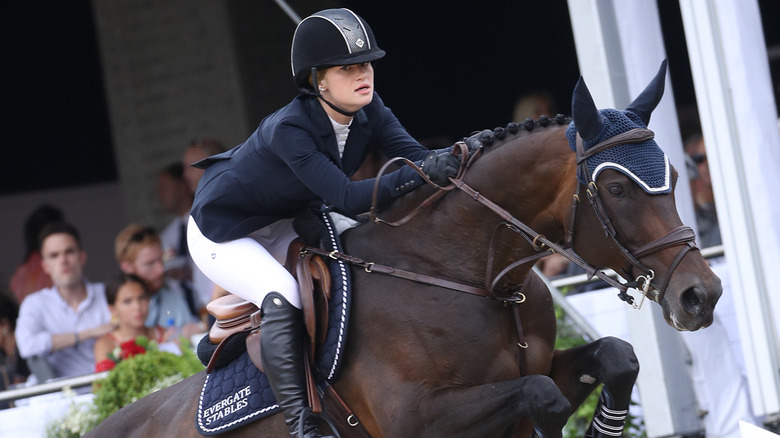 Jennifer Gates riding a horse