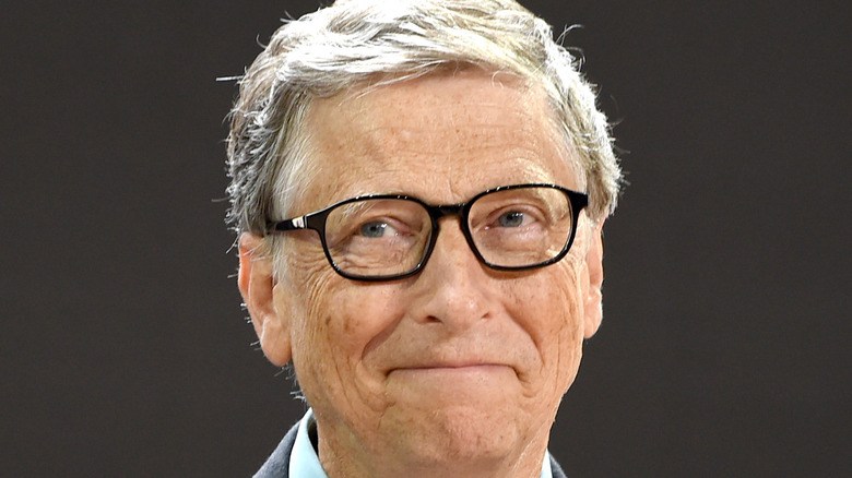 Bill Gates smiles at an event