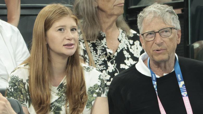Jennifer Gates and Bill Gates sitting in a crowd