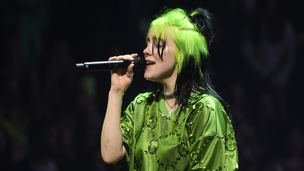 Billie Eilish performing on stage