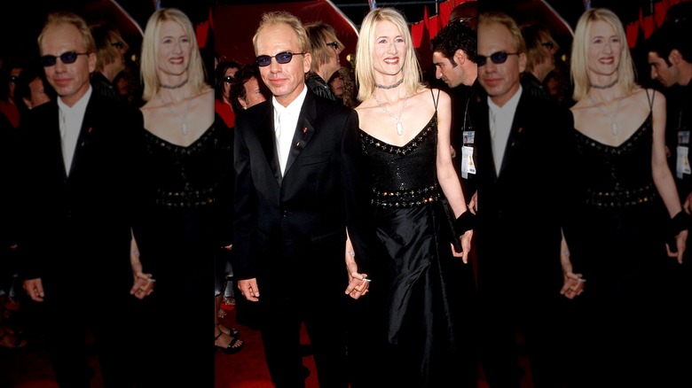 Billy Bob Thornton standing next to Laura Dern at an event