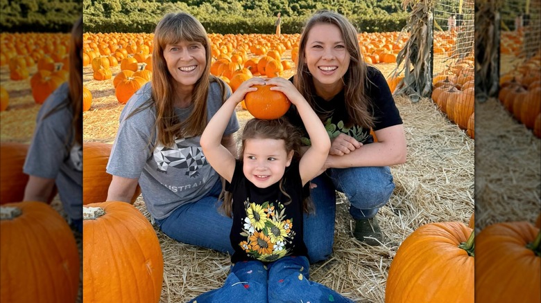 Terri Irwin, Grace, and Bindi Irwin at a pumpkin patch