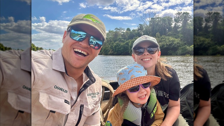 Chandler Powell, Bindi Irwin, and Grace ride on a boat together