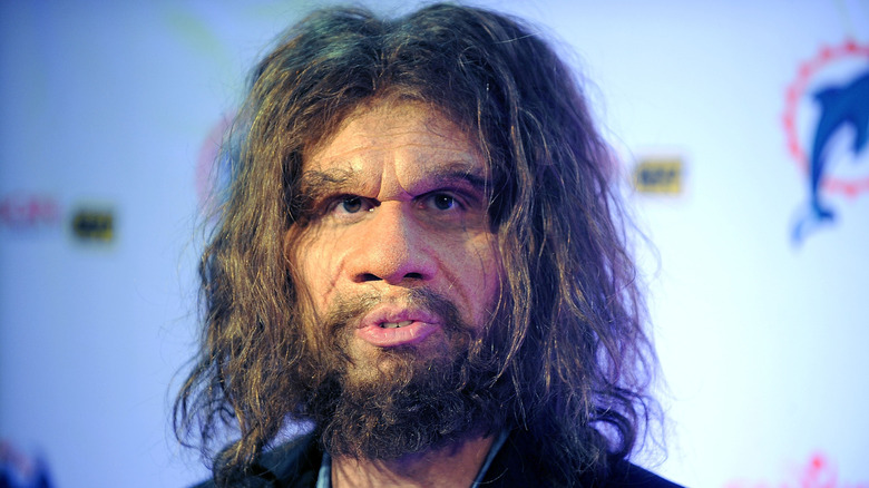 GEICO Caveman attending an event.